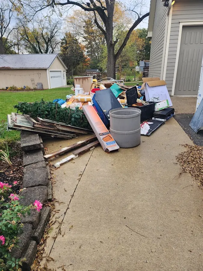 Dumpster being loaded with debris for 30 Yard Dumpster Rental in Redstone